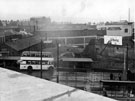Bus shelters, Coulston Street looking towards Spring Street, Civic Restaurants Dept. office and stores, left, A.T. Bescoby and Sons Ltd., paper bag manufacturers, rear