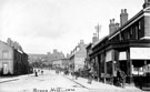 Brook Hill looking towards the University from Sarah Street, showing J.H. Hollely, hay and straw dealer, Joseph Edley and  fancy leather goods