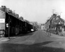 Broomspring Lane photographed from Broomhall Street, railings belong to Springfield School, Hanover United Methodist Church can be seen in the background