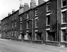 Derelict housing on Cavendish Street from outside Springfield School, fifth house from left (with gable visible) was No 69, although all the houses to the right were derelict, the houses on the left from No. 69 were still occupied until 1974
