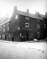 Junction of Burgess Street (Nos. 42 - 46) and Cross Burgess Street, No. 46 greengrocers shop belonging to Thomas Wilson on corner