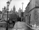 View: s13996 Cadman Lane during the demolition of Walker and Hall, Electro Works photographed from Eyre Street