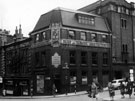 View: s14022 Cambridge Street and Wellington Street from Cross Burgess Street, No. 44 R.J. Stokes and Co. Ltd., paint manufacturers and No. 52 Nell's Bar