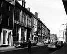 Cambridge Street looking towards Barkers Pool, shops include Nos. 16 - 18 Cambridge Chambers including J. Gilder and Co. Ltd., motor car agents and dealers, No. 14 Piccolo Snack Bar and No. 12 Hairdressers