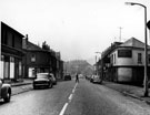 View: s14104 Carlisle Road, Grimesthorpe looking towards Earl Marshal Road showing former B and C Co-op and Fred Allison, butcher corner of Moss Street ( left) The Wellington Inn corner of Clevedon Street