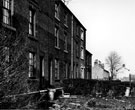 Fronts of Nos. 48 - 44 and rear of 34 - 42 Carwood Terrace taken from waste land on Carwood Crescent