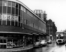 Charles Street looking towards Pinstone Street, photographed from Union Street, No. 22 Charles Street, Reed and Bullivant, tailors, Wilks Bros and Co. Ltd., ironmongers, Imperial House, Union Street