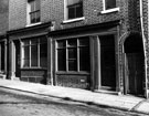 No. 101 Charles Street, these 100 year old shop fronts were demolished Feb-March,1966