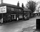 Church Lane, Dore showing No. 7 Hare and Hounds public house and the butchers