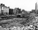 Construction of Arundel Gate showing the excavations for underpass (including Fras. Rigby and Co, wire workers and machinery guard makers, Nos. 25 - 27 Eyre Street)