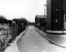 No. 2 and 4 (centre of picture) Coleford Place, Darnall showing corner of No. 212 Coleford Road (right) and rear of properties on Industry Road