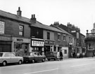 Convent Walk and West Street (left), including No. 1 Convent Walk, Douro Wine Shops Ltd., wine and spirit merchants, Nos. 5 - 7 Leadbetter and Peters Ltd., opticians, No. 11 A. G. Burrell and Co., watch and clock makers