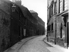 Cornish Street, Netherthorpe, former Cornish Inn, left, with gas lamp. George Barnsley and Sons, steel manufacturers, Cornish Works, right. James Dixon and Sons Ltd., silversmiths, Cornish Place Works in background