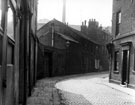 Cornish Street, Netherthorpe. Premises include former Cornish Inn, centre and James Dixon and Sons, silversmiths, Cornish Place Works, rear. George Barnsley and Sons, steel manufacturers, Cornish Works, right