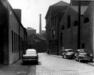 Cornish Street, Netherthorpe. North British Steel Works, left. George Barnsley and Sons, steel manufacturers, Cornish Works, right. Former Cornish Inn and James Dixon and Sons, silversmiths, Cornish Place Works, in background (with chimney).