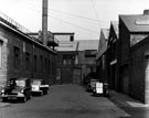 W. K. West Ltd., packing case makers (right) North British Steel Works (left), Cornish Street, Netherthorpe looking towards Regent Works