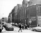 View: s14689 Cross Burgess Street from Cambridge Street, Albert Fowler Ltd., Overall factory (former Deaf and Dumb Institute), right