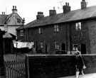 Basford Street and rear of Nos. 289 - 299 which front to Darnall Road (this terrace of six houses originally comprised Freedom Hill with Darnall Cottage, of which the gable end can be seen)