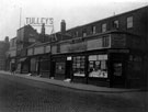 Nos. 14 - 28 Division Street at corner of Carver Lane including E. T. Hodgson, City Protestant Book Depot, No. 16 City Coal Office and Nos. 24 - 30 J. S. Tulley and Co., photographers Nos. 14 - 28 Division Street at corner of Carver Lane including E. T. Hodgson, City Protestant Book Depot, No. 16 City Coal Office and Nos. 24 - 30 J. S. Tulley and Co., photographers