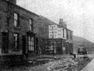 Copy of The Star's newspaper photograph of the flooding after a rainstorm on Dolphin Street, Darnall. The clouded yellow water flowed past Dolphin Street down Broad Oaks Lane to the railway line