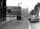 Duke Street and Talbot Street junction looking towards Park Hill Flats. No. 200 (left) Oddfellows' Inn, No 179, C and A Reed Ltd, Funeral Directors (Oriel House) 	