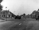 Dykes Hall Road at junction of Far Lane, showing (left) No. 195 J. Hopkinson, hairdresser and (right) The Beehive Inn, right