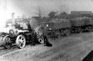 Traction engine pulling carts loaded with bricks, most probably Sheffield Road, Woodhouse, opposite Guymer's Farm, 1890-1903?