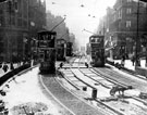 View: s15348 Re-laying the tram tracks on Pinstone Street, Tram Nos 185 and 132 in foreground