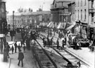 View: s15360 Haymarket looking towards Waingate and Royal Hotel, tramway under construction, Norfolk Market Hall on right