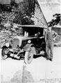 Mr. Taylor standing beside a Morris Cowley (registration UM 4001), 1920/1.