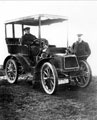 Mr. Warren (driving) and Studebaker car, registration no. D 10 78, Mr. Lucus, standing Mr. Warren (driving) and Studebaker car, registration no. D 10 78, Mr. Lucus, standing