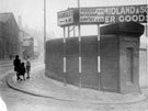 View: s15400 Entrance to London Midland and Scottish Railway Wicker Goods Station and electric direction sign on corner of Spital Hill and Savile Street