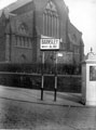 Wicker Congregational Church, telephone box and A61 road sign Burngreave Road, an illuminated classified road sign used where the obvious route does not happen to be the main road
