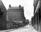 Looking towards Howard Street and Eyre Lane from Howard Street (Dinner Hour) Club for Working Women and Girls (left), former premises of Thomas Otley and Sons, Britannia metal manufacturers, left