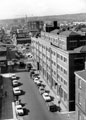 Elevated view of Eyre Street from roof of Central Library, Walker and Hall Ltd., Electro Works, right