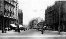 View: s15585 Fargate, 1895-1915, Bank Chambers, left, including No. 58 G.N.R. Co., passenger enquiry offices and No. 60 Harold W. Mills and Co., ironmongers, Albany Hotel, Yorkshire Penny Bank and Carmel House, right