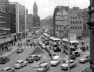 View: s15592 High Street looking towards Fargate, site of Cole Brothers, department store, right, No. 9 Austin Reed Ltd., mens outfitters, Fargate Court and Marks and Spencer, left