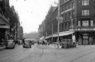 View: s15598 Looking towards Fargate from High Street, Cole Brothers, department store and 'Cole's corner', right