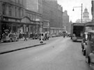 Fargate showing of vans and private cars, Nos. 16 - 30 Robert Proctor and Son, drapers and Cole Brothers, department store