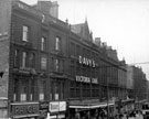 View: s15622 Fargate including Nos. 42-46 Winchester House (including Provincial Insurance Company), No. 46 Paige Gowns, Nos. 38-40 Arthur Davy and Sons, provision dealers and Victoria Cafe