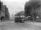 Fargate from Town Hall Square, including (right) No. 61 Scholl's (Dr.) Ltd., No. 63 Bradwell Bros, umbrella manufacturers, Y.M.C.A., Carmel House, Albany Hotel and Yorkshire Penny Bank