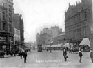 View: s15644 Fargate from Town Hall Square, Bank Chambers, left, including No. 58 G.N.R. Co., passenger enquiry offices, No. 60 Harold W. Mills and Co., ironmongers, No. 63 Bradwell Bros, umbrella manufacturers and Y.M.C.A., Carmel House, right