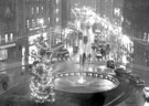 Town Hall Square looking towards Fargate showing Christmas Illuminations and Goodwin Fountain, Bank Chambers, left