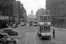 View: s15654 Fargate from Town Hall Square including Tram No. 245, Yorkshire Penny Bank and Albany Hotel, right, Town Hall Square Rockery, left