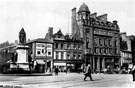 View: s15664 Town Hall Square/Fargate, looking towards Leopold Street, including No. 70 Sheffield Creameries Ltd. (corner of Leopold Street), No 68 Loxley Brothers Ltd., printers, No. 66 Fleur de Lys public house and Bank Chambers, (left) Queen Victoria Statue