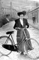 Lady and bicycle in Birchinlee Village
