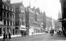 View: s15735 Fargate from High Street, 1950 - 1955, Cole Brothers, right, No. 9 Austin Reed Ltd., men's outfitters, Nos. 11 - 15, Goldsmith's Chambers including No. 11 Sheffield Goldsmith's Co. Ltd., No. 2 High Street, Barclays Bank Ltd.