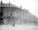 Formerly F. Gandy's butchers shop No. 126 Upper St. Philips Road and derelict housing awaiting demolition on Fawcett Street
