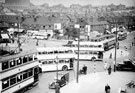 Traffic congestion at Firth Park roundabout, Firth Park Road showing bottom of Bellhouse Road, St. Hilda's Church and housing