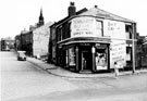 Nos. 118 - 120 E.S. Lake's corner shop, Fitzalan Street and corner of Montfort Road, Burngreave with the spire of Andover Street Methodist Church Nos. 118 - 120 E.S. Lake's corner shop, Fitzalan Street and corner of Montfort Road, Burngreave with the spire of Andover Street Methodist Church
